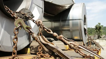 grade 70 transport chain binder with grab hooks on flatbed truck